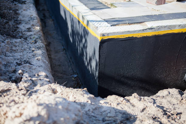 Professional Waterproofing technician working in Dunkirk, OH